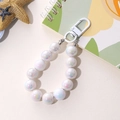 Detail shot of iridescent mermaid beads charm with a white lobster clasp for bags - Mermaid Beaded Pendant (K1989) / White