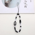 Detail of beaded phone strap with black and white checkered cubes and a cute bear charm - Black White Checkerboard Bear Style (K1030)