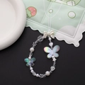 Detail view of handmade beaded phone strap with iridescent butterflies and white bow - AB Iridescent Butterfly Style (K998-AB)