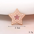 Macro detail of star-shaped charm with pearls, pink rhinestones, 2.5cm size and 3.7g weight - Star (Gold Base Pink) (D1867)