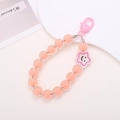 Detail of pink beaded keychain with a star smiley face charm and a heart lobster clasp - Star Smiley Face Pendant-Orange (K1619)