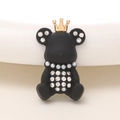 Close-up of matte black crown bear charm with golden crown and sparkling white rhinestones - Crown Bear (D1760) / Black