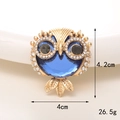 Macro detail of owl brooch with blue gemstone showing 4.2cm height and 4cm width - Silver Base Royal Blue Owl