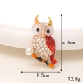 Detailed view of owl brooch with red wings and white pearl showing 4.5cm height dimension - Gold Base Red Branch Owl