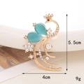 Detailed macro view of crystal peacock brooch showing size 5.5cm x 4cm and 9g weight - Alloy / D179 Peacock (Blue)
