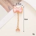 Ciondolo a fiocco in resina rosa con catena dorata e strass, largo 2,3cm e lungo 6cm - Ciondolo a Fiocco Rosa (D620)