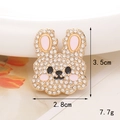 Vista dettagliata del ciondolo a coniglio con strass con altezza 3,5 cm e larghezza 2,8 cm - Coniglio Bianco Base Oro (D966)