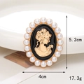 Detail showing vintage portrait cameo brooch with pearls and size 5.2cm x 4cm - Black Cameo