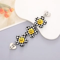 Detail of sunflower phone charms with checkered patterns and heart-shaped metal clasps - K732 Checkerboard Flower Bracelet (Heart Clasp)