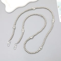 Silver beaded crossbody strap with unique irregular metallic charms and lobster clasps - Irregular Fluid Style
