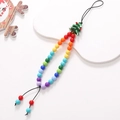 Detail view of colorful beaded phone strap with a festive green Christmas tree pendant - Christmas Tree Bead Pendant Style (K1437)