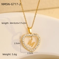Close-up of 18K gold plated heart pendant with zircon frame and moving letter M - 18K Gold / Letter M (NMSN-G717-2)