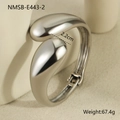 Macro view of silver geometric teardrop bangle with a smooth polished metallic finish - Silver Fluid Droplet Style (NMSB-E443-2)