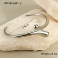 Detail view of silver stainless steel open cuff bracelet with bead and droplet ends - Steel Color Sphere Curve Style (NMSB-E441-2) / 18K Gold