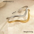 Detalle de brazalete bicolor de acero inoxidable con 6,9 cm de ancho y 35 g de peso - Chapado en oro 18K / Estilo de Ola Bicolor (NMSB-B521-3)