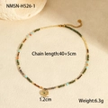 Detail view of colorful beaded necklace with gold Evil Eye charm and extension chain - Multicolor Beads with Gold Eye Pendant Ethnic Style (NMSN-H526-1)