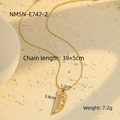 Detailed view of horn pendant necklace with white zircons and product dimensions - Gold White Zircon