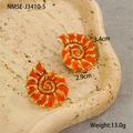 Macro shot of orange shell earrings with gold lining on a natural stone tray - 18K Gold / Red Conch Stud Earrings (NMSE-J3410-5)
