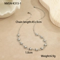 Détail des breloques étoile de mer sur un collier en acier argenté avec dimensions - Style Petite Étoile de Mer (NMSN-K315-1)