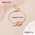 Macro shot of gold chain bracelet with pink enamel flower charm and lobster clasp detail - One Size / Pink Flower Bracelet (NMSB-J429-2)