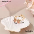 Detail of golden bow ring with pink enamel and crystals on decorative shell base - One Size / Pink Bowknot Ring (NMSR-J431-3)