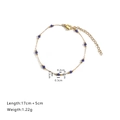 Elegante pulsera de cadena dorada con cuentas de piedra azul facetadas y cierre de langosta - Pulsera / Azul Zafiro