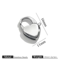 Macro detail of a heart-shaped stainless steel lobster clasp sized 16mm by 11mm - 16mm / Steel