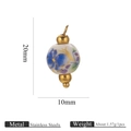 Ciondolo floreale in ceramica con acciaio inossidabile e dettagli in sfere dorate - Orchidea Oro 10mm