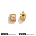 Macro detail of 18k gold plated stainless steel bead with micro-inlaid crystals - White