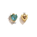 Golden heart-shaped tennis chain charm with turquoise gemstone and hollow back view - Lake Blue (9)