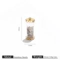 Detail view of 33mm cylindrical glass pendant with natural stones and gold steel caps - Multicolor Stones (5)