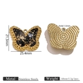 Macro detail of butterfly pendant in black and gold foil with stainless steel texture - Butterfly (3)