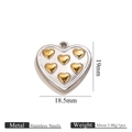 Two-tone stainless steel heart pendant featuring six small golden hearts inside - Two-Tone Heart Pendant 1