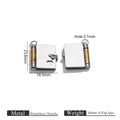 Detailed macro view of locket pendant size and stainless steel material info - Book Locket Style / Gold and Steel Mixed