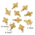 Vue détaillée de pendentifs éléphant dorés avec dimensions de 14,5 mm et texture gravée - Éléphant