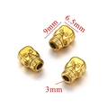 Drie gouden schedelkralen voor sieraden met een diameter van 9 mm en 3 mm gat - Ronde Schedel-Goud