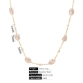Detail of stainless steel gold chain necklace featuring irregular baroque pearls and clasp - Style 6 Necklace