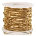 Macro view of stainless steel golden box chain wound on a plastic white spool - US 1.5 / Gold