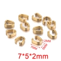 Detail van gouden roestvrijstalen knijpbeugels 7x5x2mm voor DIY sieraden maken - U-Vorm Klein - Goud