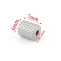 Detailed macro view of silver textured 7x6mm stainless steel tube bead with 2mm hole - 6x7x2 Knurled Pattern / Steel