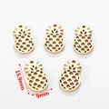 Detailed view of five 15.9mm golden pineapple-shaped stainless steel DIY jewelry charms - Pineapple Style / Gold
