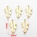 Golden stainless steel feather charms for DIY jewelry 26mm x 11mm pack of five - Leaf Style / Gold