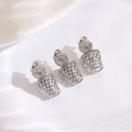 Detailed macro view of three silver basketball hoops with zircon charms for DIY jewelry making - Basketball Charm / Steel Color Basketball