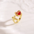 Detailed close-up of a red heart zircon and thorn cross on a vintage open ring - Cross Thorn Heart Style (ZYN-DMR285G)