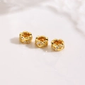 Detailed macro view of 18K gold-plated spacer beads with hollow petal design and zircon - Hollow Wave Petal Style Gold (ZYN-DMK1250G)