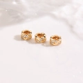 Macro detail of 18K gold plated spacer beads with zircon for DIY jewelry making - Hollow Wave Petal Style Rose Gold (ZYN-DMK1250KCG)