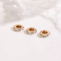 Macro detail of 18K gold plated spacer beads with inlaid clear cubic zirconia crystals - Rectangle Inlaid Ring Style Rose Gold (ZYN-DMK1263KCG)