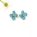 Exquisite light blue four-petal flower stud earrings with 18k gold plating on white background - Lake Blue