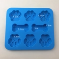 Molde de silicona azul cielo con 6 cavidades en forma de pata de gato y hueso para repostería - Molde 6 Cavidades Pata Gato Hueso / Azul