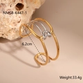 Detail view of gold and silver tone layered bangle with interlocking U-shaped buckle detail - Gold & Silver Two-Tone Multi-Loop Style (NMSB-K447-1)